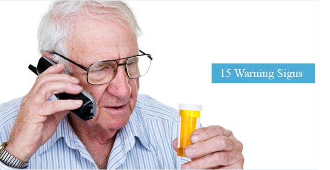 Senior having difficultly reading a bottle of medication